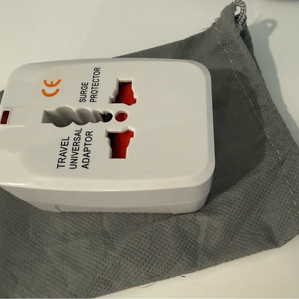 Universal White Travel Adapter with Surge Protector